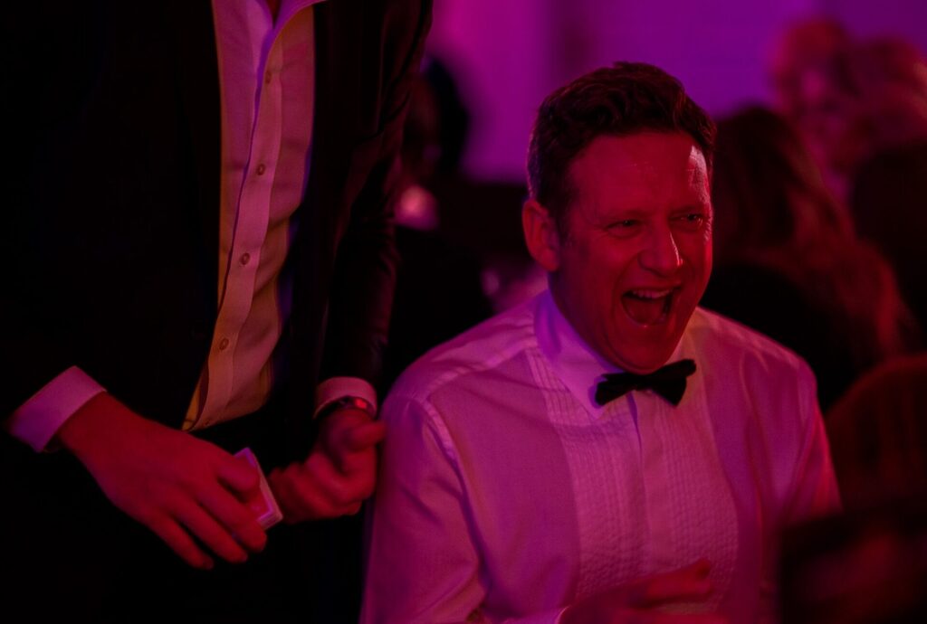 magician-london-hire magician London entertaining at a black tie dinner